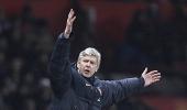 Wenger slams Old Trafford pitch