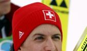 Swiss Ammann soars to first gold