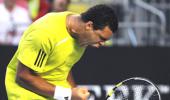 Tsonga wins five set thriller to enter quarters