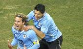 Uruguay beat Ghana on penalties to reach semis