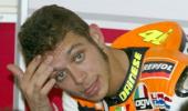 Rossi rides again, hopes for early return