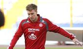 Denmark's Bendtner expected to miss opener