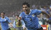 Images: Suarez dream double puts Uruguay through