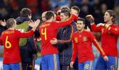 Spain bypass Portugal to reach last eight