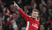 Champions League images: Bendtner performs a 'trick'