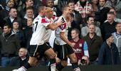 United escape at Villa, Spurs end winless run