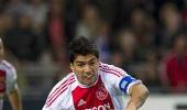 Ajax ban Suarez for biting PSV player