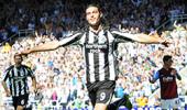 Newcastle Utd striker Carroll charged with assault