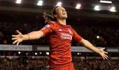 Carroll double helps Liverpool crush Man City