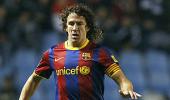 Barca captain Puyol back from injury for Real tie