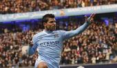 Images: Aguero magic helps leaders Man City march on