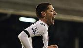 EPL: Late Dempsey winner sinks 10-man Liverpool