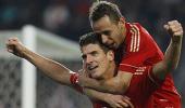 Ten-man Bayern charge six points clear