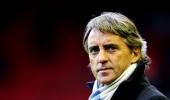 Mancini wants away-day cheer for Man City