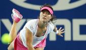 Li wins fight with Bartoli and hubby