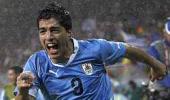 Luis Suarez completes Liverpool move