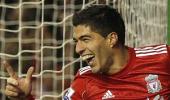 Suarez scores as Liverpool beats Stoke