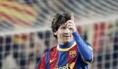 Messi hat-trick puts Barca 10 points clear