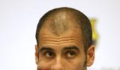 Guardiola to extend Barca contract to June 2012