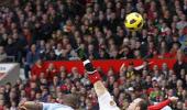 Rooney's 'bicycle' pedals Man Utd past City