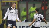 CLeague images: Spurs stun Milan, Raul strikes in Spain