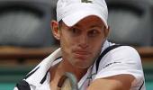 Defending champion Roddick rolls on at Brisbane