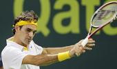 Dominant Federer through to Doha final