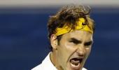 Federer survives scare from bogeyman Simon