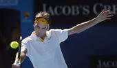 Aus Open Images: Federer marches on, Kuznetsova ousts Henin