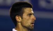 Djokovic destroys Berdych for crack at Federer