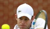 Roddick survives ace barrage by Lopez at Queen's