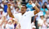 Federer stunned by Tsonga