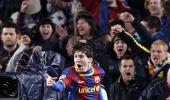 CL Images: Messi mauls Arsenal as Barca go through