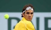 Federer, Djokovic and Roddick reach third round