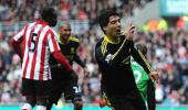 Slick Suarez seals Liverpool points