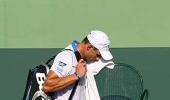 Ailing Roddick exits, Nadal and Federer advance