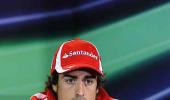 Alonso happy to take points after messy start