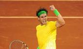 Nadal fights back to beat Federer in Madrid