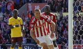 Arsenal's title hopes end with defeat at Stoke