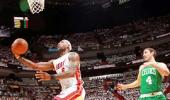 James shines as Heat finish off Celtics