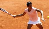 Images: Djokovic, Schiavone off to a blazing start