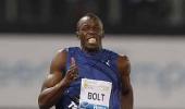 Bolt edges Powell, Americans dominate in Rome