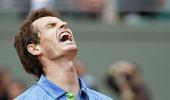 Murray battles past Troicki in rolled-over match