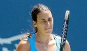 Top seed Bartoli retires injured in Bali