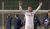 Beckham drives Galaxy past Bulls to Western final