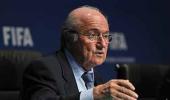 Blatter apologises but will not resign