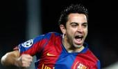 Champions League: Xavi tips the scales for Barca, Arsenal through