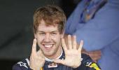 Vettel takes record pole in Brazil