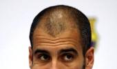 Barca's Guardiola asks players to raise their game