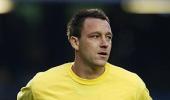 Police question Chelsea skipper Terry over racism claims